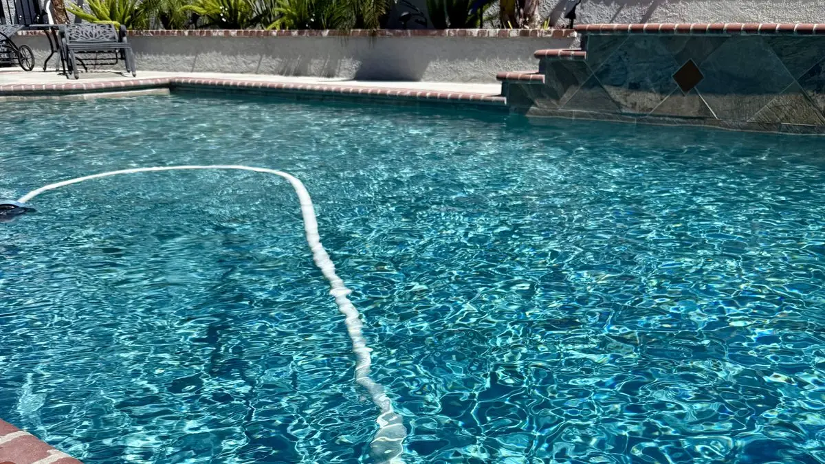 Weekly pool service cost in North Texas shown at a clean backyard pool