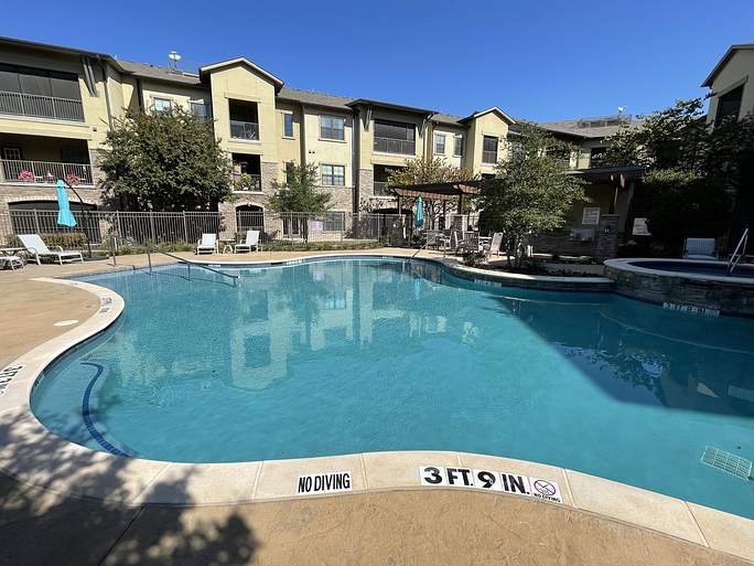 Apartment complex pool with a no diving depth marker