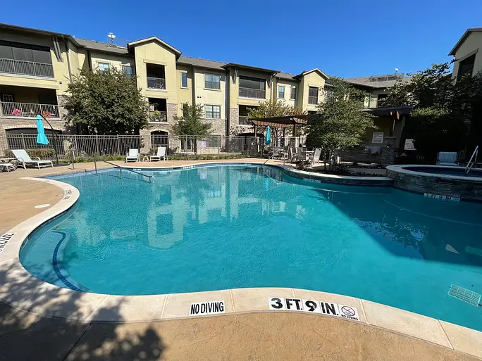 Apartment complex pool with a no diving depth marker