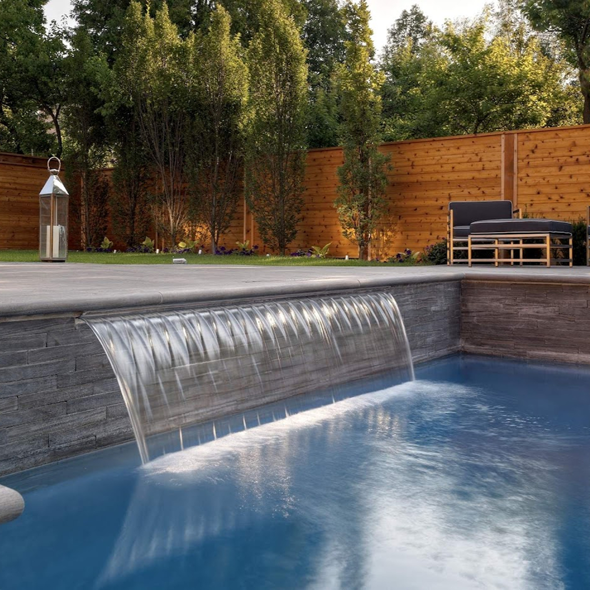 Sheer descent waterfall added to an existing pool