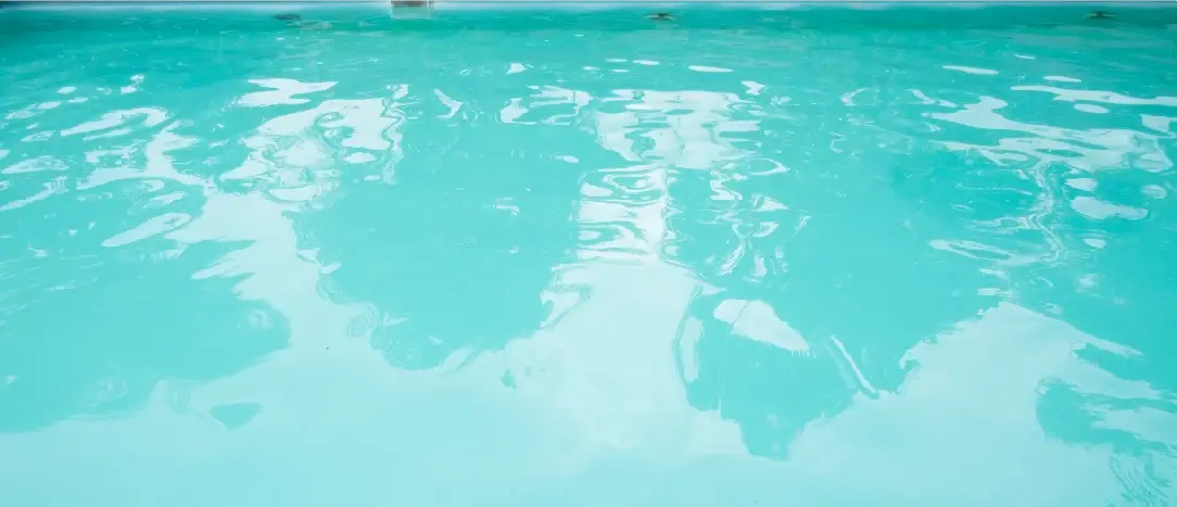 Clear turquoise pool water, the goal when fixing cloudy pool water